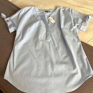 Talbots brand light blue blouse with ties on the side